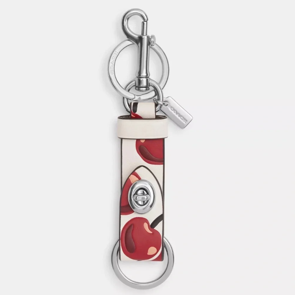Coach Trigger Snap Bag Charm With Cherry Print nwt in packaging - Picture 1 of 3